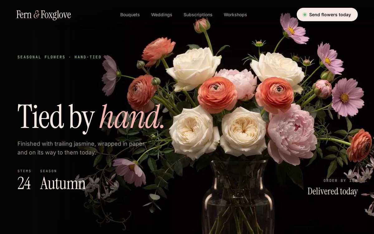 Fern & Foxglove florist concept: a hand-tied bouquet of roses, peonies and ranunculus in a glass vase beside the headline Tied by hand.